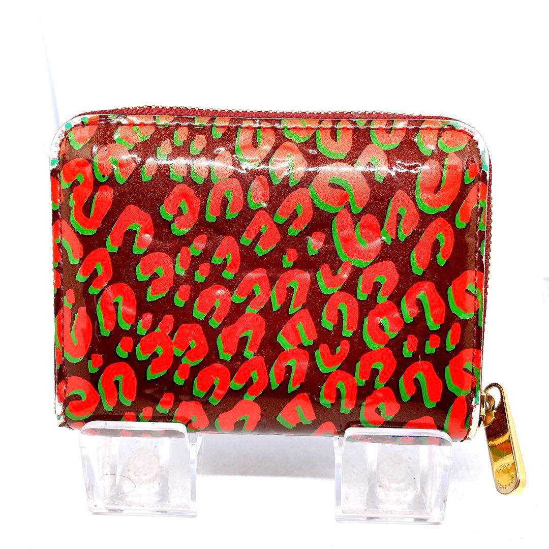 818 ルイヴィトン モノグラム　レオパード　折り財布　ジッピーパース