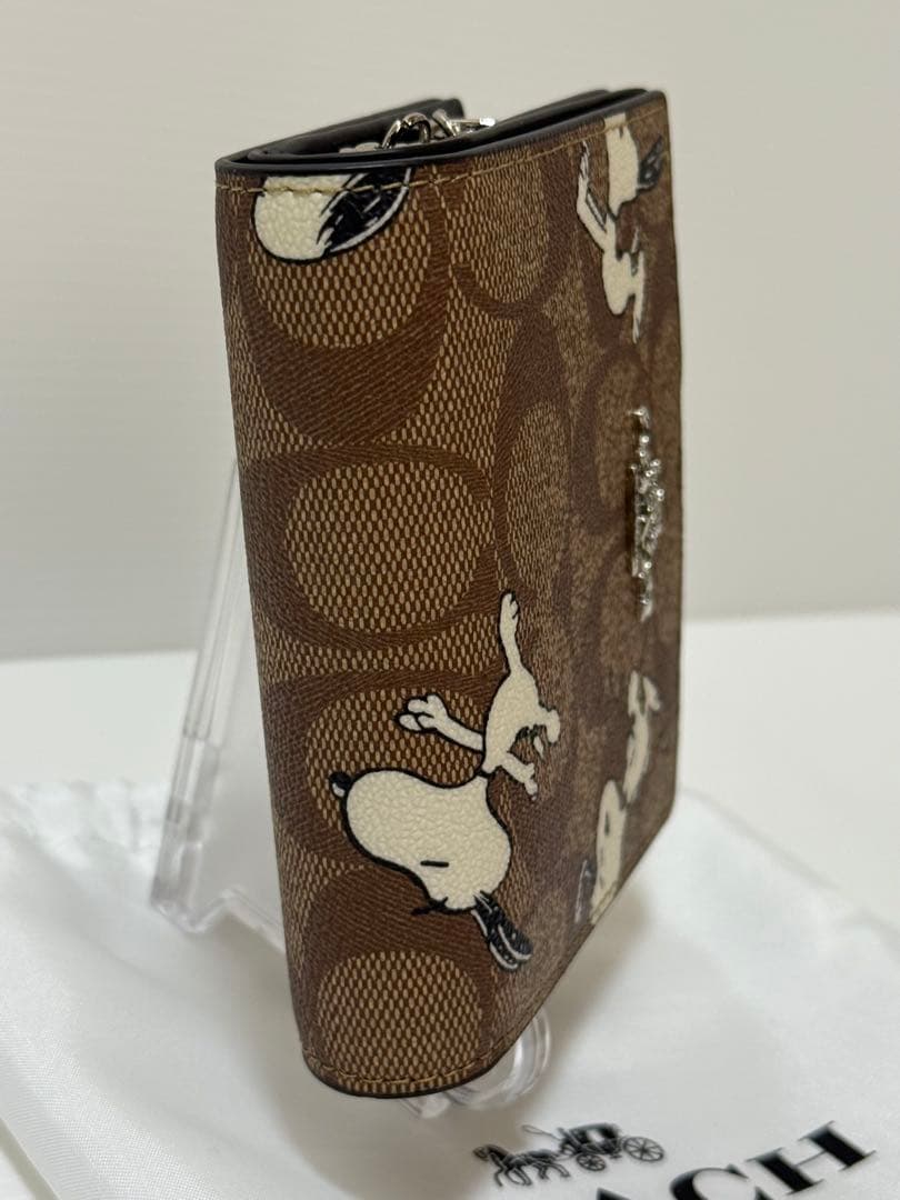 COACH × PEANUTS（スヌーピー）二つ折り財布 型番：C4591