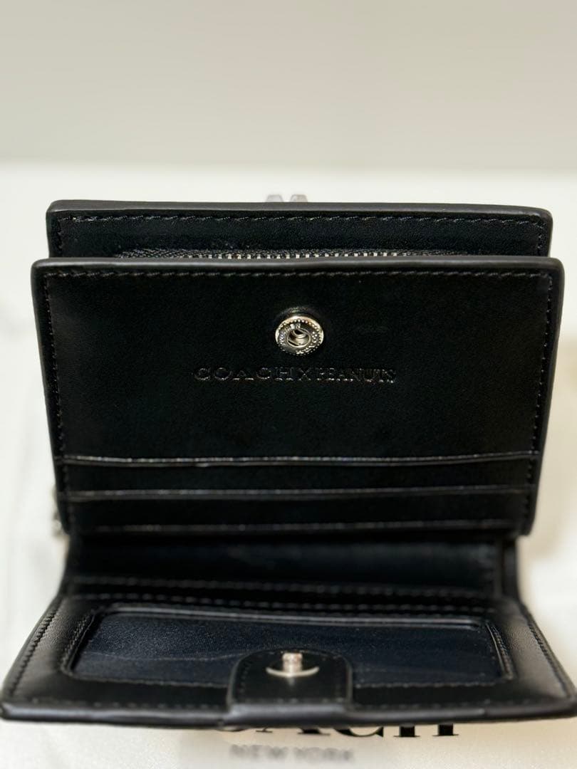 COACH × PEANUTS（スヌーピー）二つ折り財布 型番：C4591