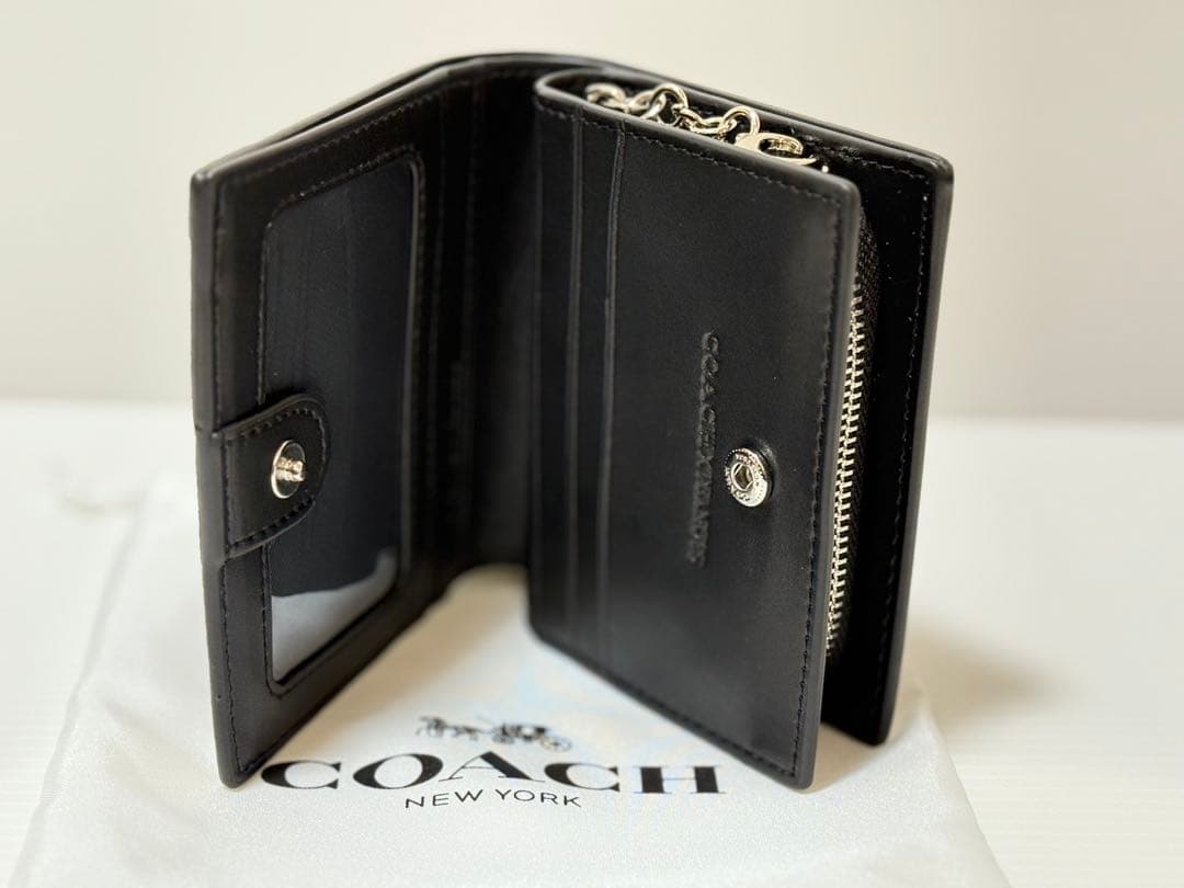 COACH × PEANUTS（スヌーピー）二つ折り財布 型番：C4591