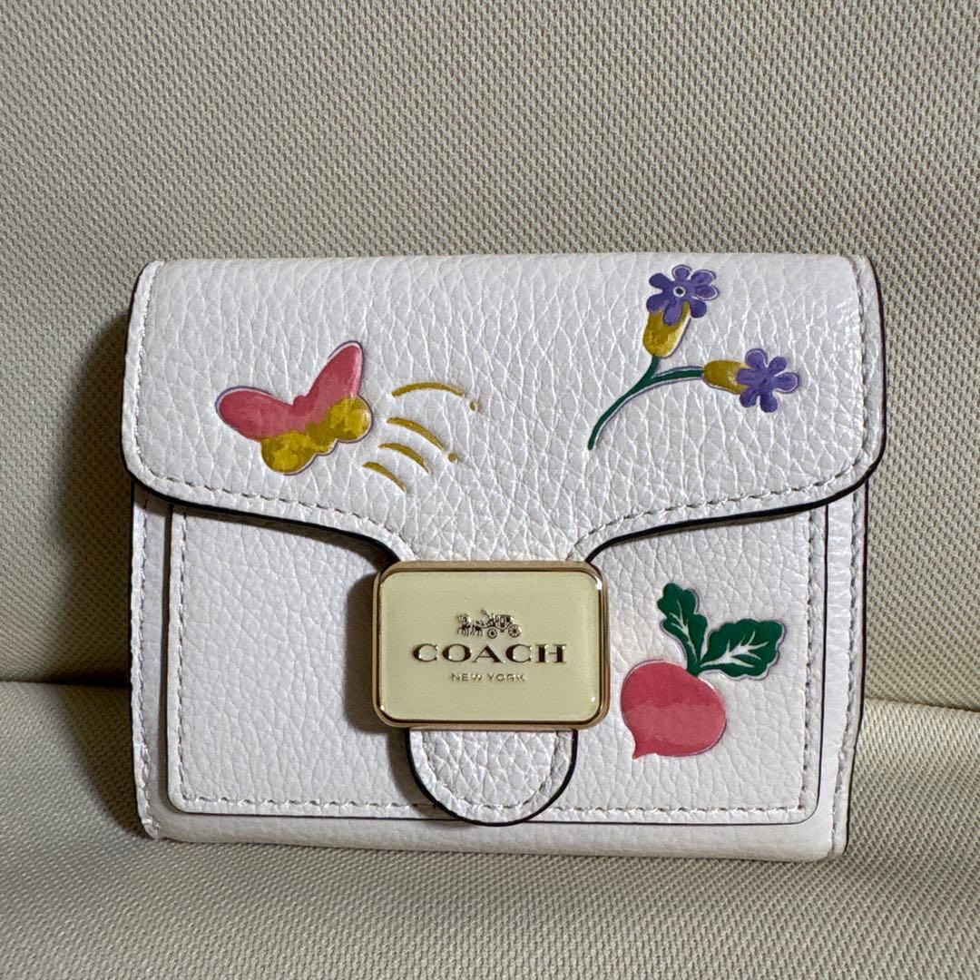 さとる様！専用商品！！COACH 花と蝶のプリント 二つ折り財布
