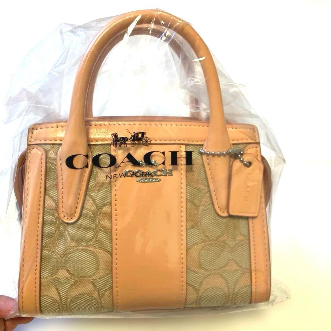 COACH サーモンピンク ハンドバッグ