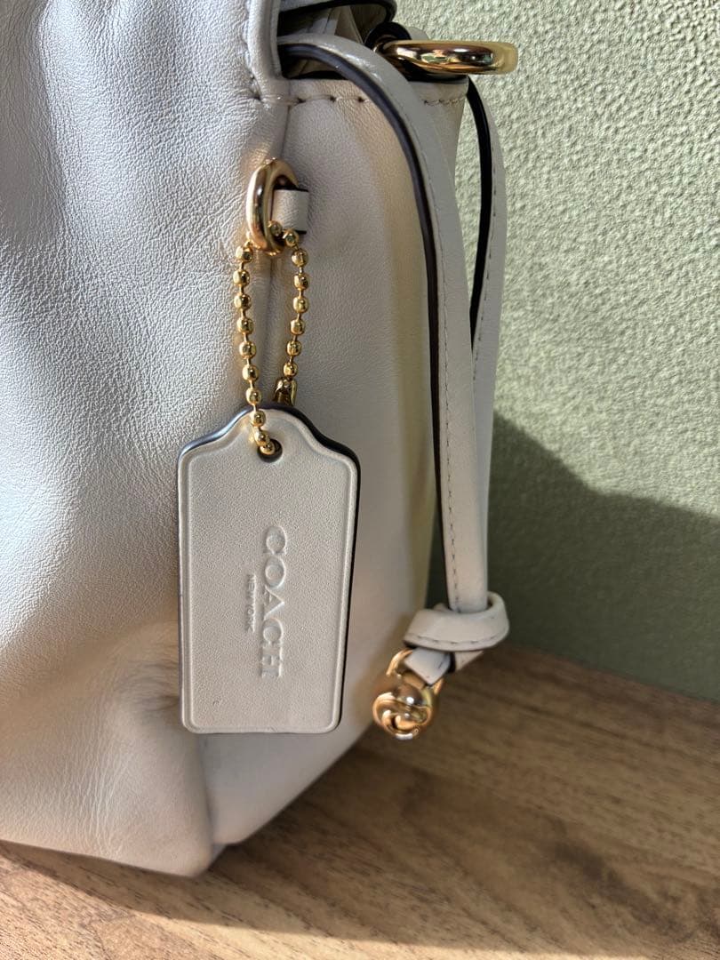 【しの様❤️専用】コーチ　フェイ　ドローストリングバック　現行品　ホワイト