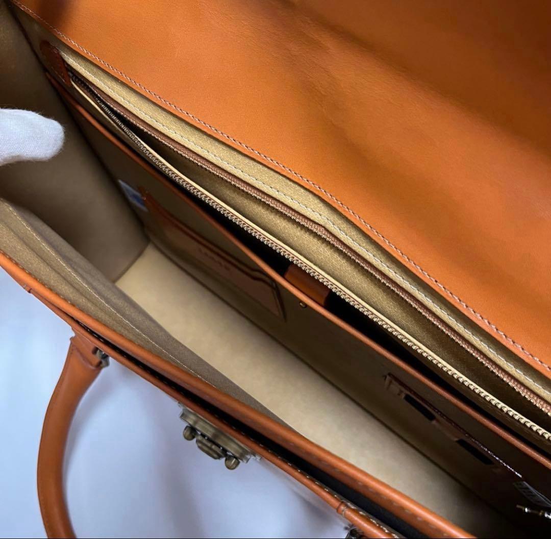 【12/31迄】《最終価格》タケオキクチ　ブリーフケース　ラップフラップダレス