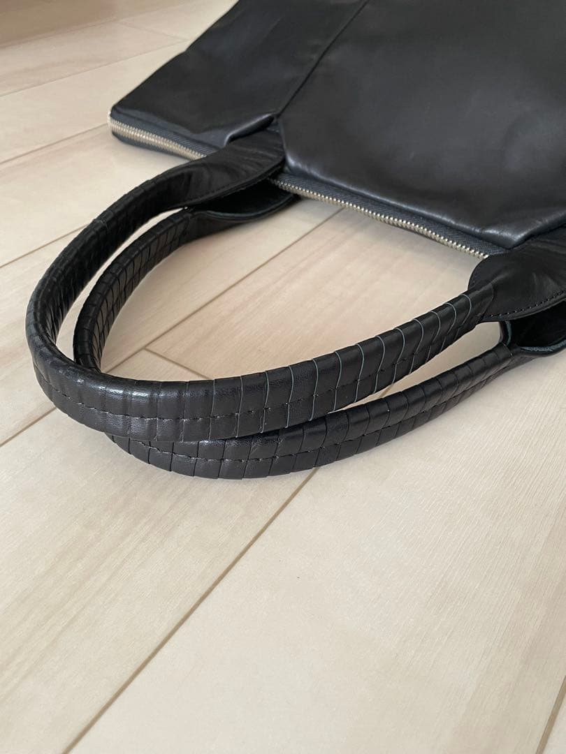 cornelian tauras by daisuke iwanaga バッグ