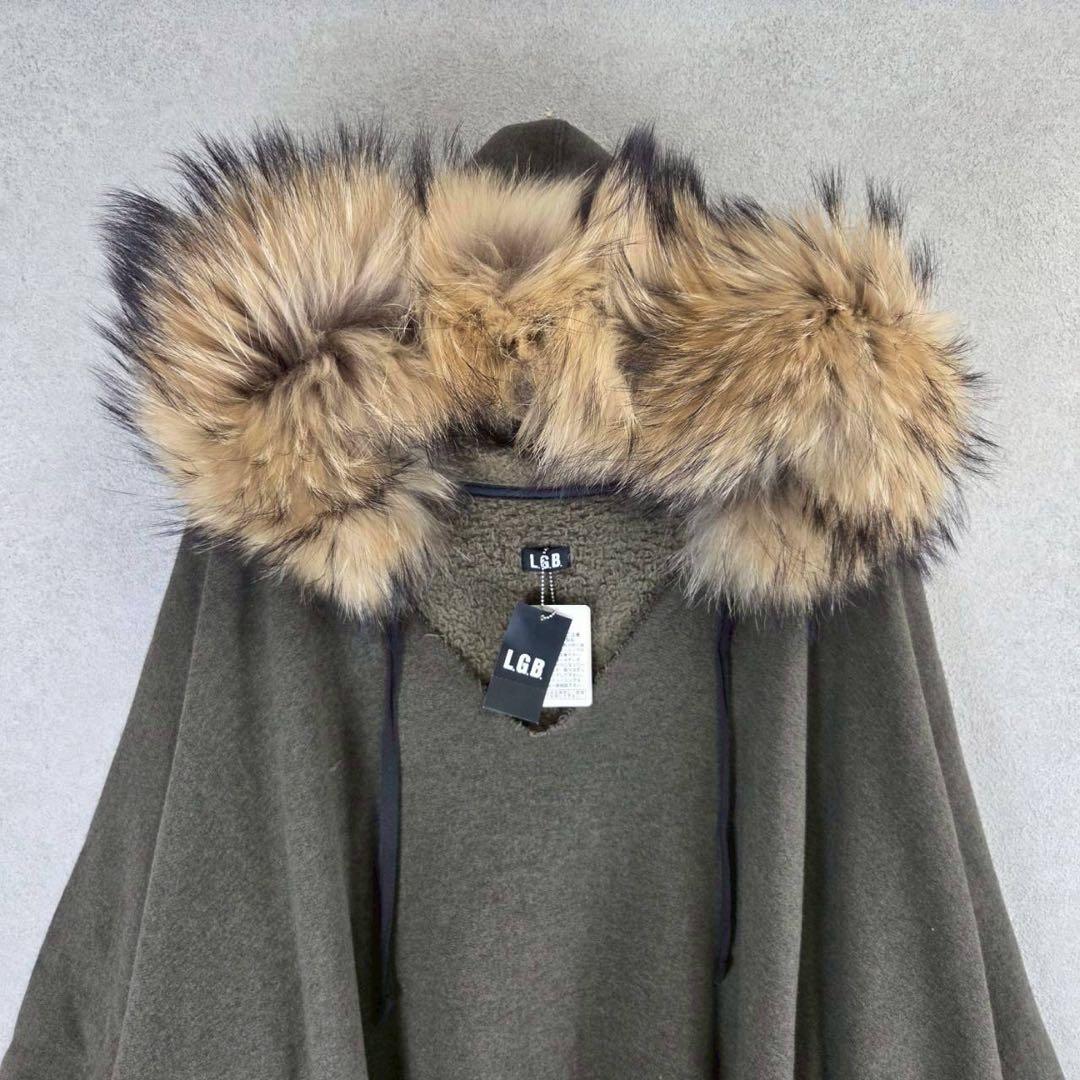 新品 L.G.B. NWT ラクーンファー ポンチョ ケープ フード パーカー
