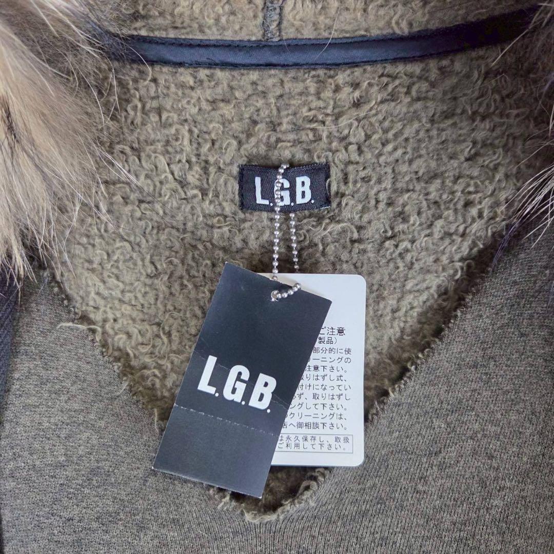 新品 L.G.B. NWT ラクーンファー ポンチョ ケープ フード パーカー