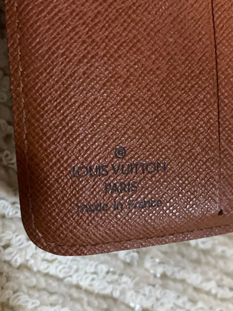 ルイ・ヴィトン 二つ折り財布 ダークブラウン。LOUIS VUITTON 。