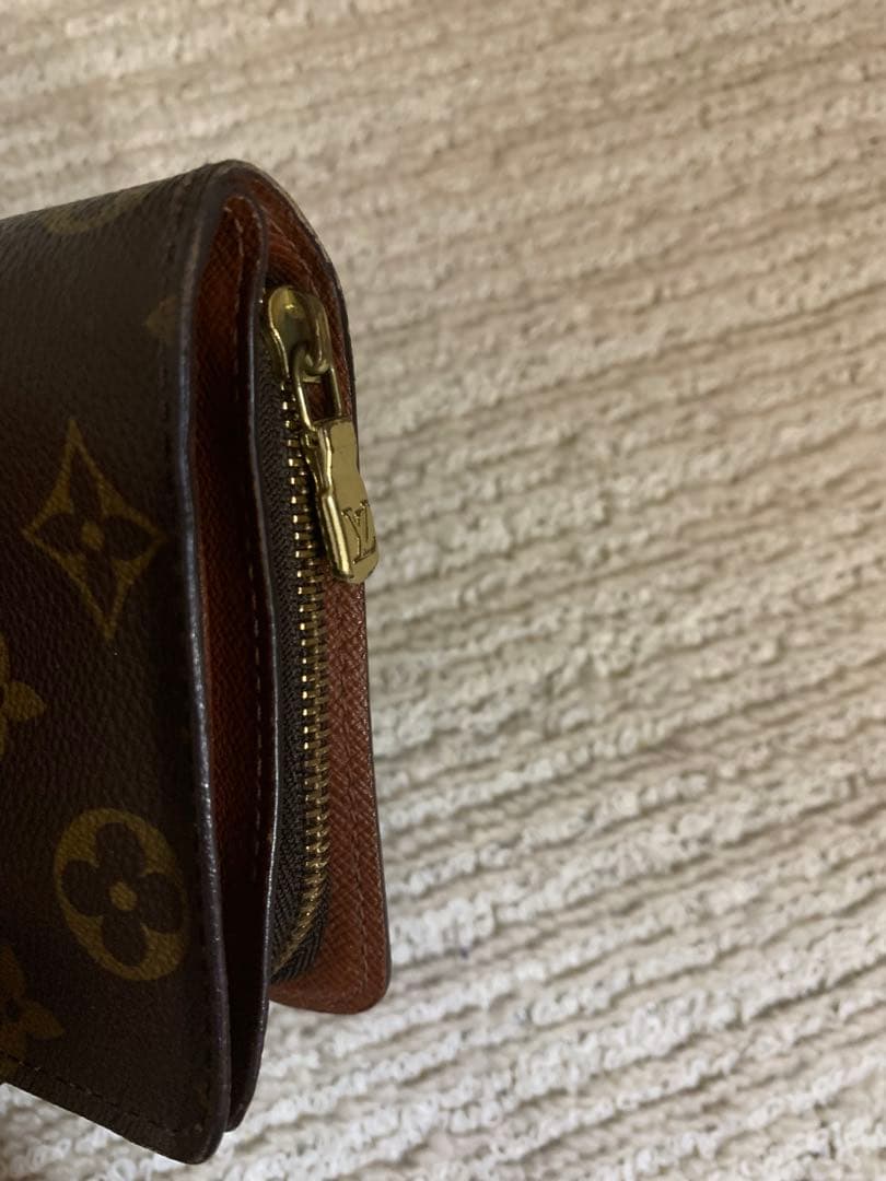 ルイ・ヴィトン 二つ折り財布 ダークブラウン。LOUIS VUITTON 。