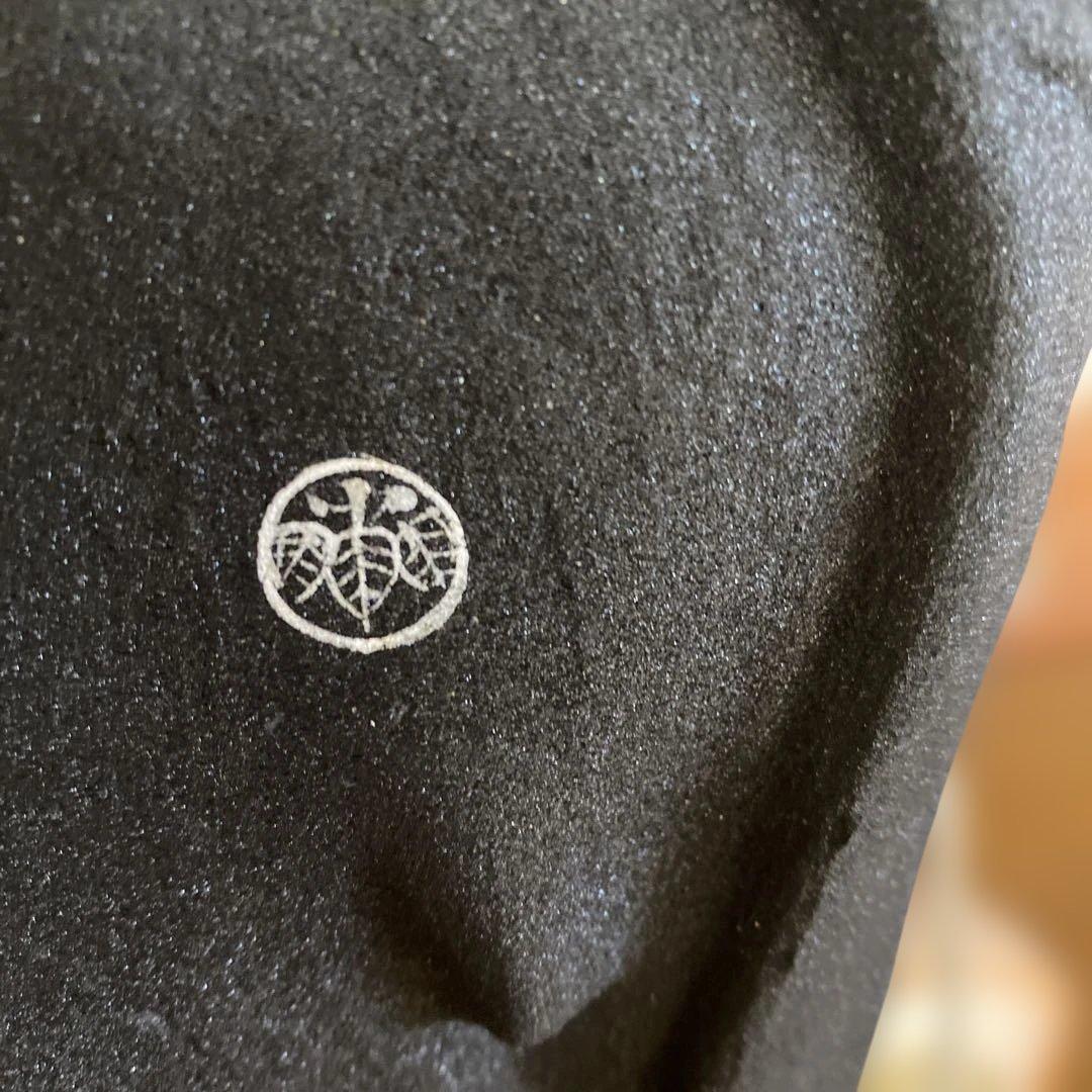 博多人形　オレンジと黒の着物