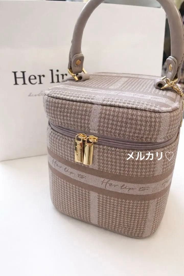 Her lip to バニティバッグ