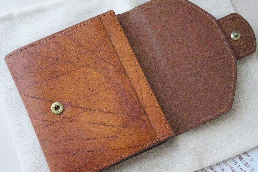 ゲンテン　エクバターナ　三つ折り財布　コニャック