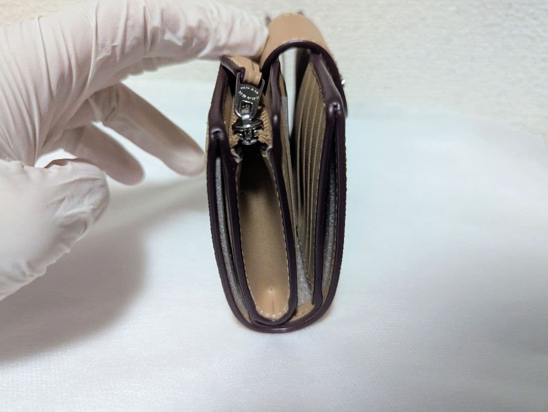 COACH 二つ折り財布 シグネチャー柄 ベージュ CW786