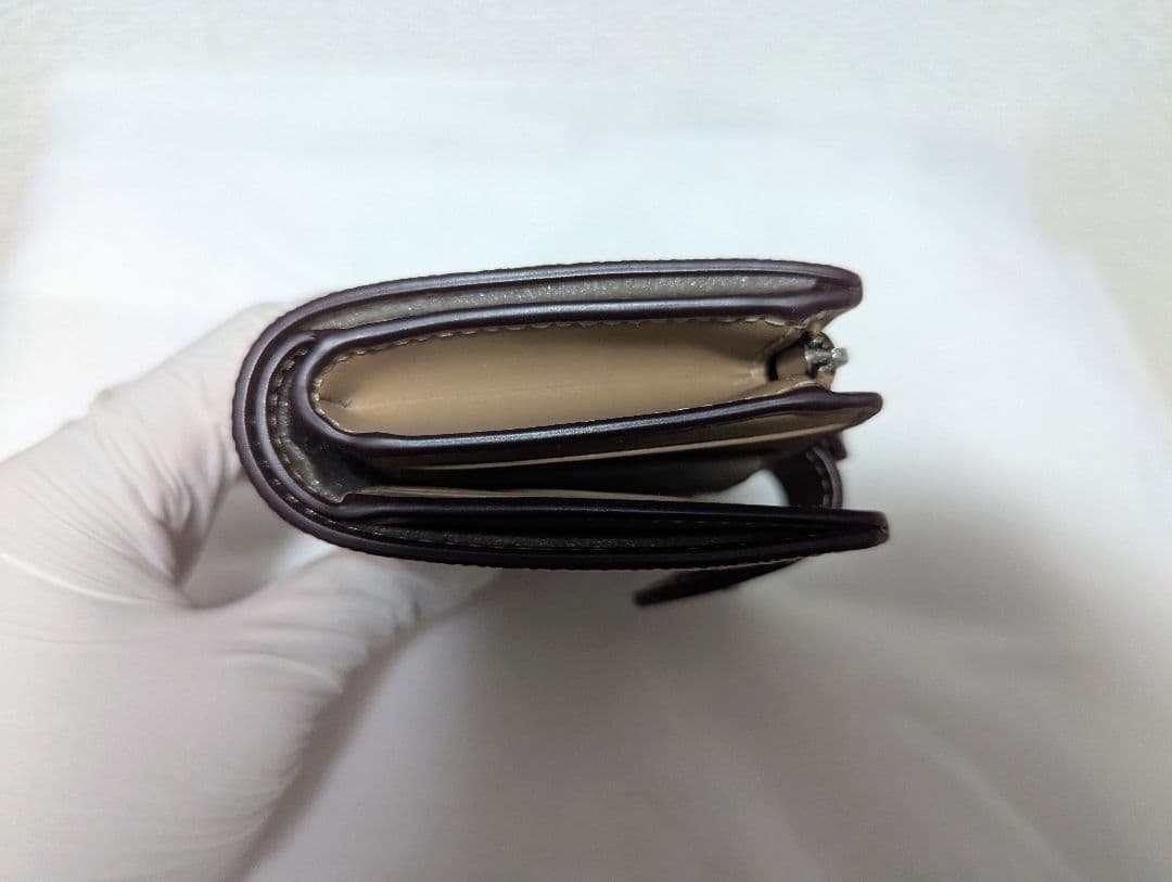 COACH 二つ折り財布 シグネチャー柄 ベージュ CW786