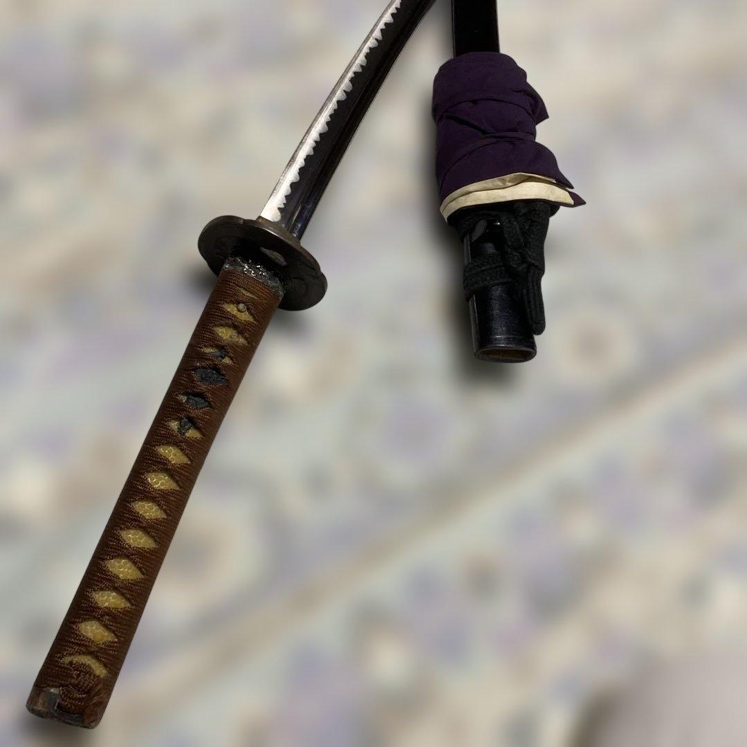 居合刀(刀袋付) 茶柄 竹笹木瓜真鍮鍔 黒梨地呂鞘