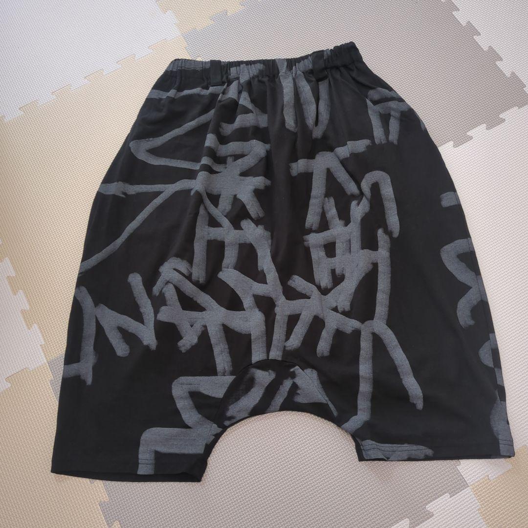 モユル　MOYURU サルエルパンツ 黒と灰色のグラフィック