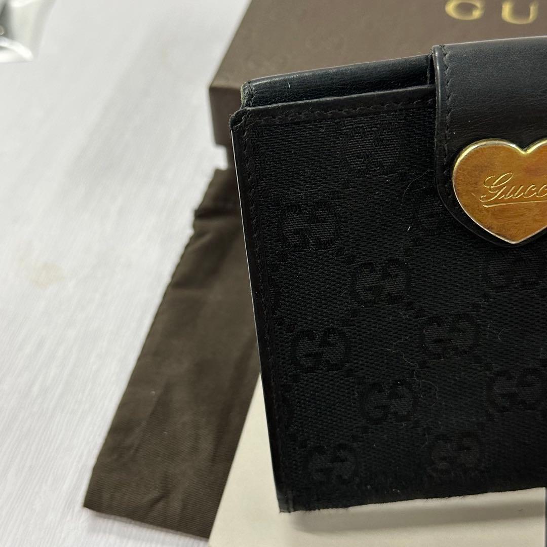 新品同様‼️ グッチ　GUCCI 財布　折り財布　GGキャンバス ハート金具