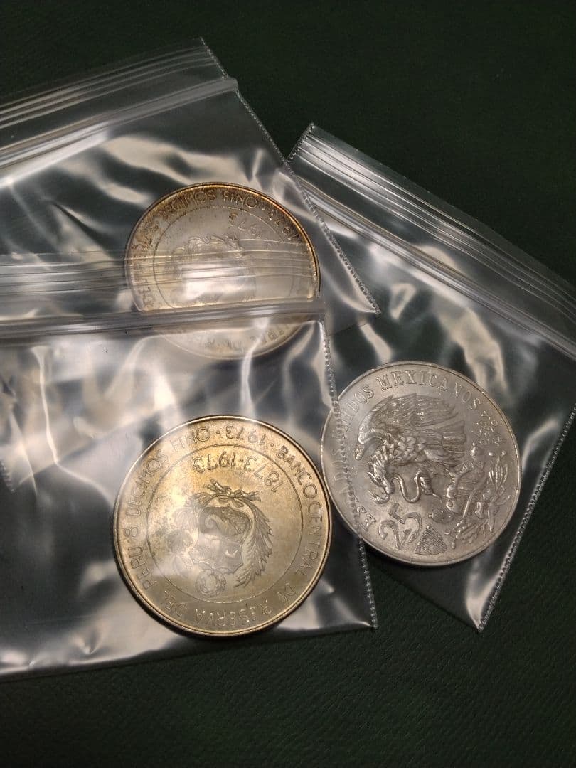 ペルー 100ソル銀貨2枚と メキシコオリンピック25ペソ銀貨の3枚組!!