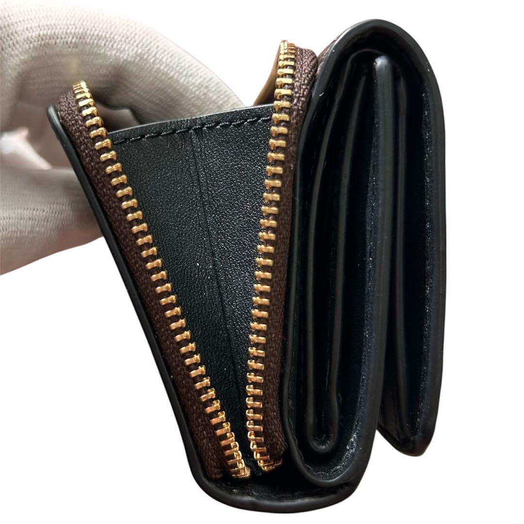 ヌルホリラ様 新品級✨ COACH コーチ シグネチャー柄 三つ折り財布