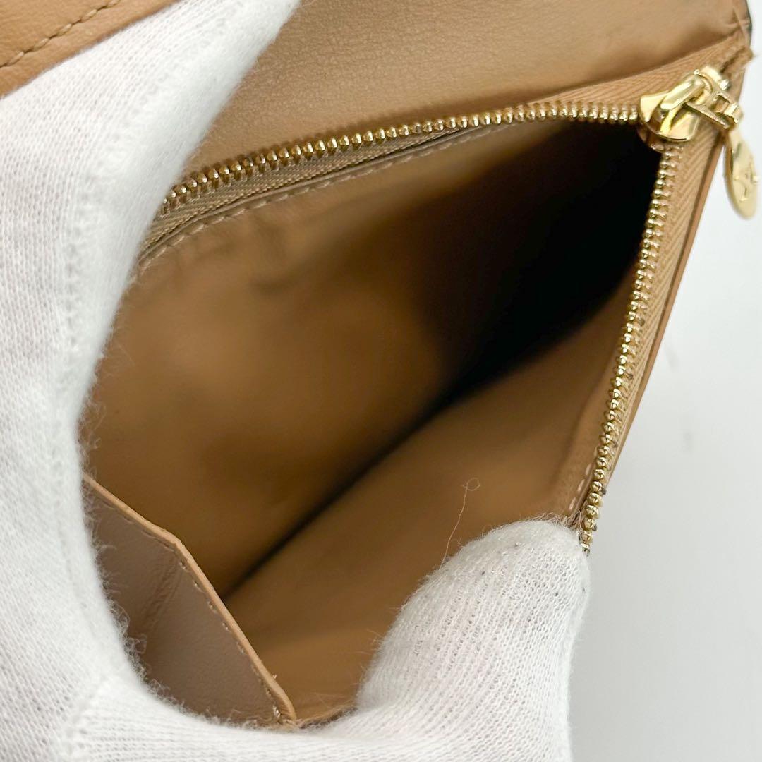 【現行品】ルイヴィトン ヴェルティカルウォレット コンパクト トリヨン 二つ折り