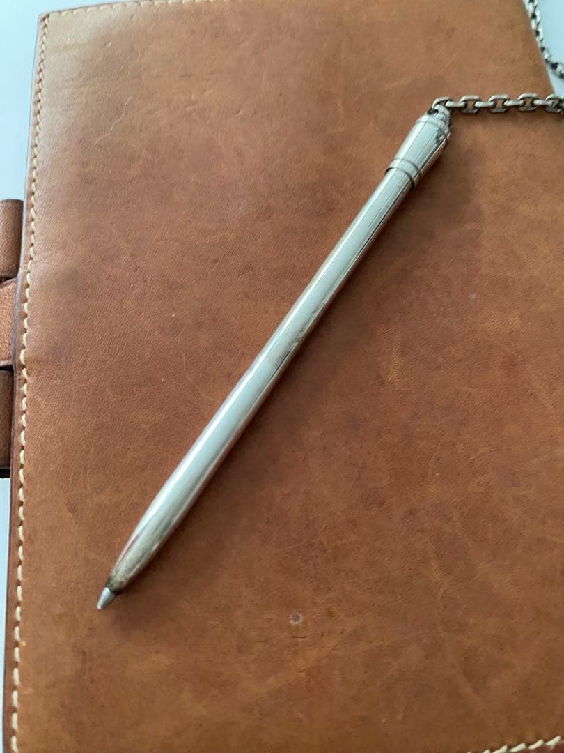 エルメス茶色い革手帳ボールペン付き