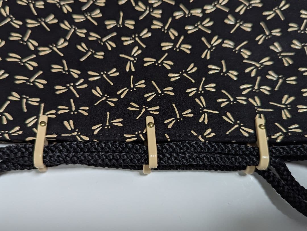 印伝巾着袋 印傳屋上原勇七 INDEN-YA 合切袋 とんぼ 黒地白漆