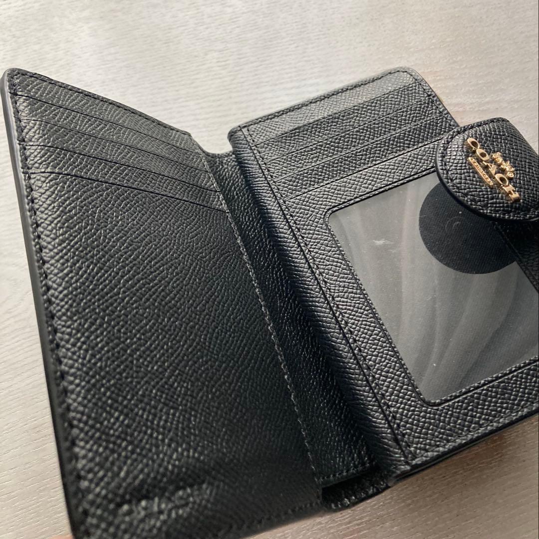 COACH コーチ　2つ折財布黒　ゴールド金具馬車ロゴ