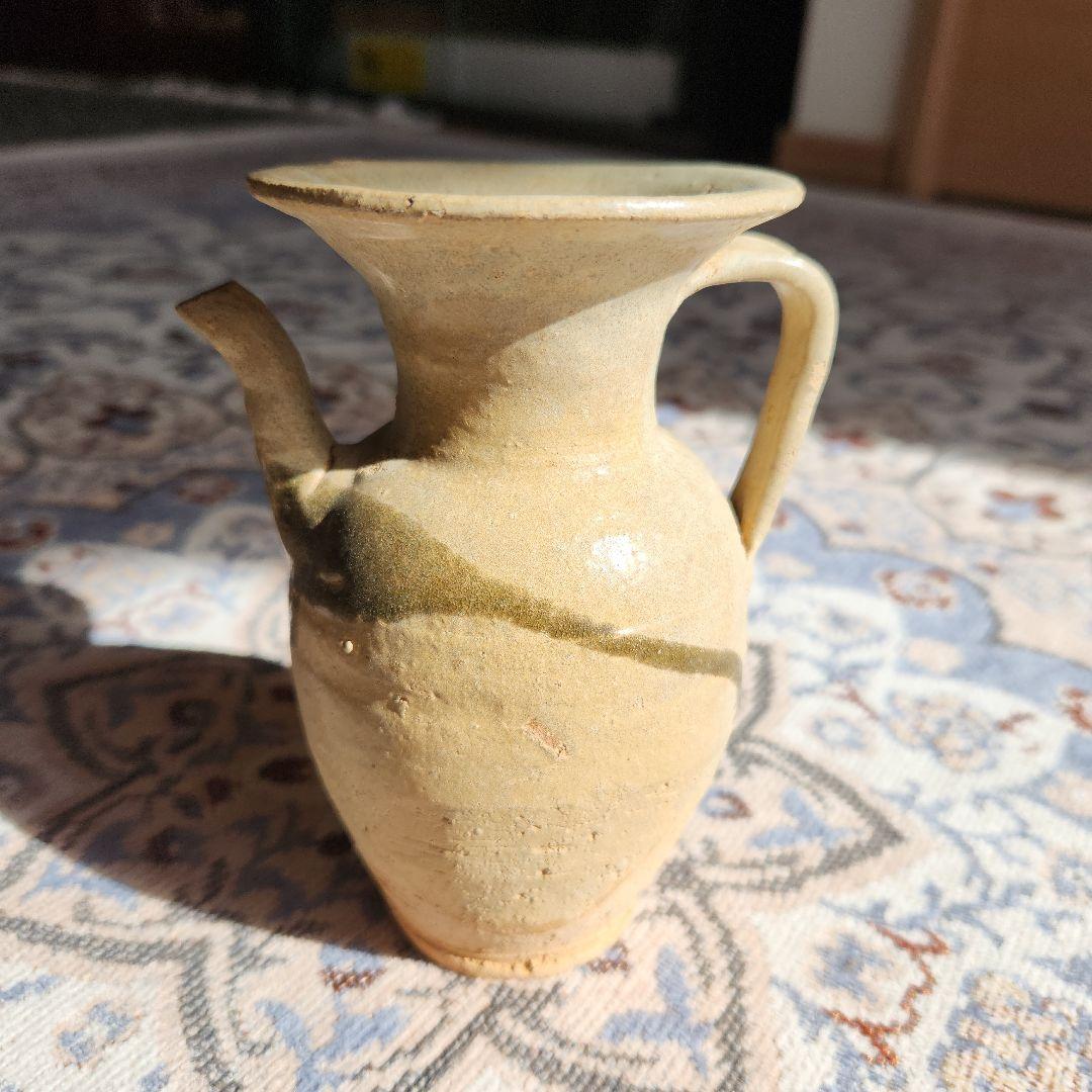 唐代長沙窯黄秞褐彩壺