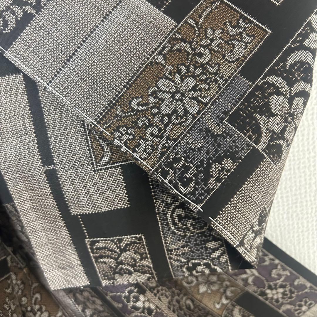 未使用品　細かな絣り！　モダン　花更紗柄　本場泥大島紬　９マルキ　着物　５１８