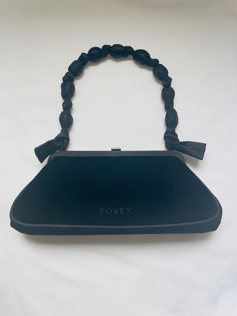 お値下げ。FOXEY ブラック クラッチバッグ
