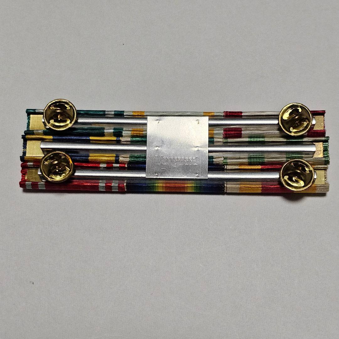 旧軍の綬リボンを米軍式に組んだ物です。旭日瑞宝金鵄勲章、従軍記章、記念章の綬