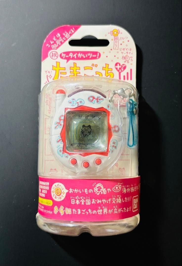 新品 たまごっちプラス 超じんせーエンジョイ TAMAGOTCHI 株主優待