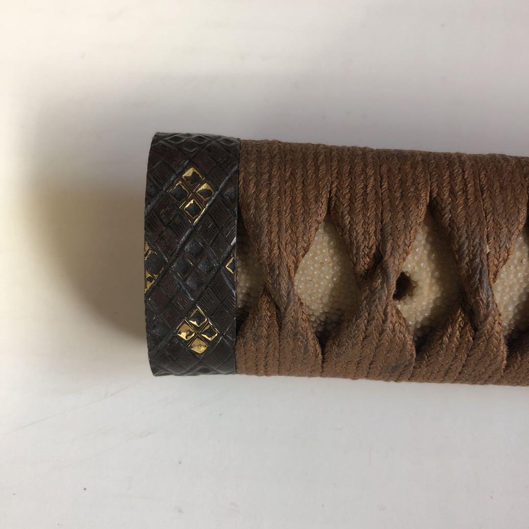 刀剣の柄　獅子目貫　23.6cm