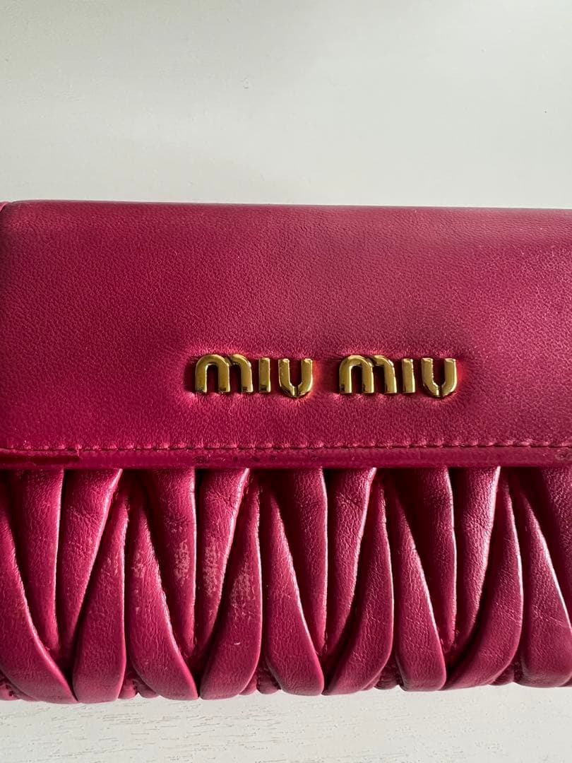miu miu ピンク 二つ折り財布