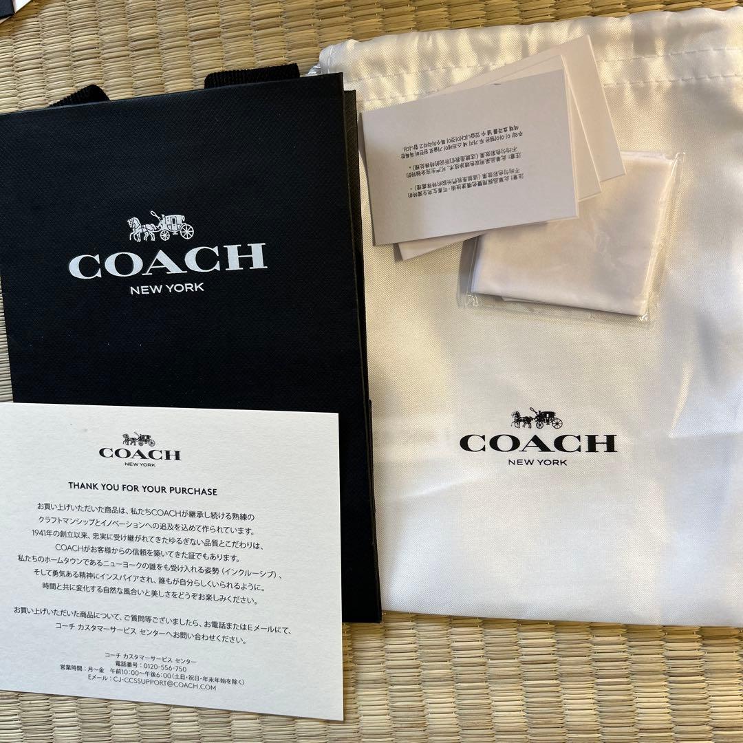 コーチ　二つ折り財布