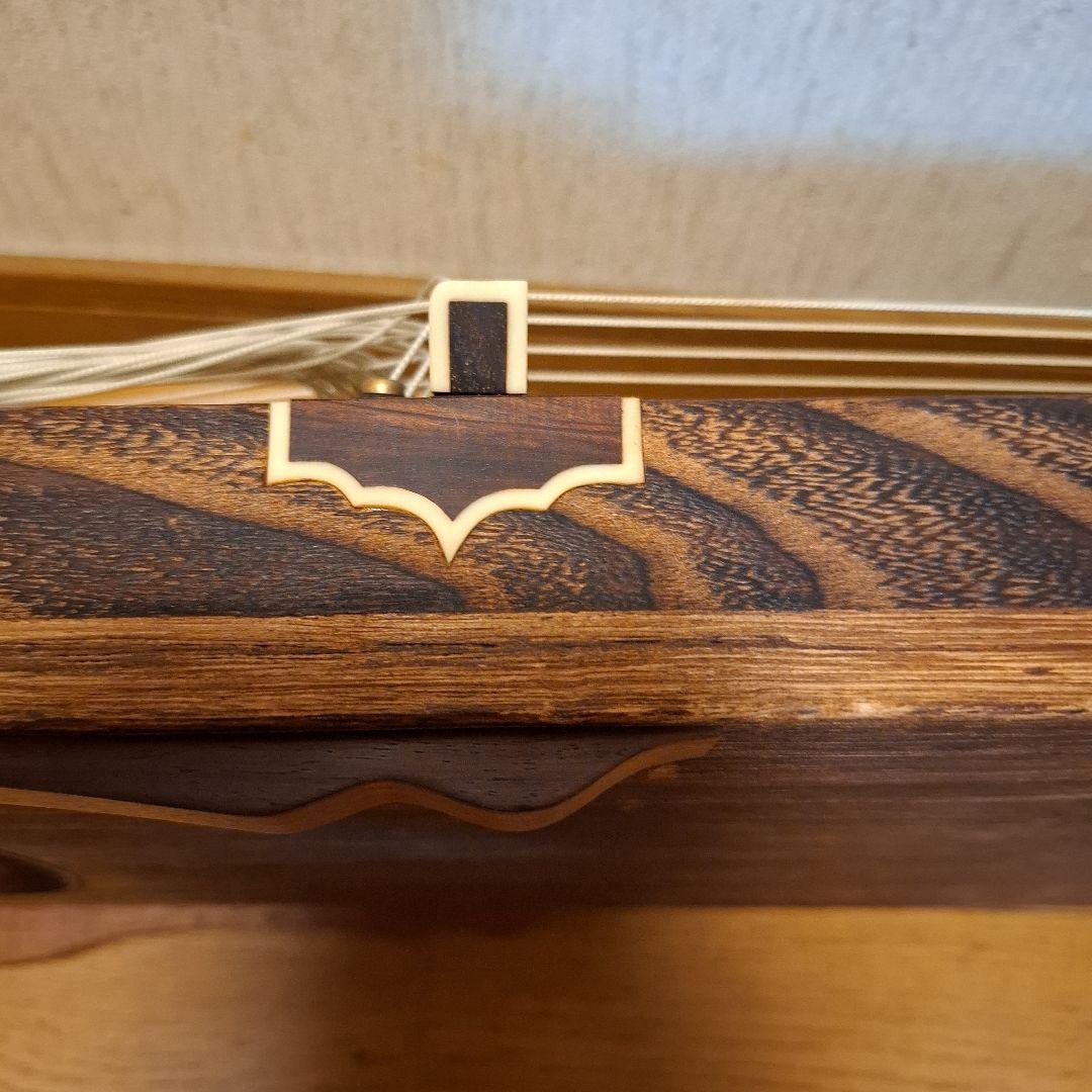 オレンジ色の鶴模様の袋つき　　　お琴