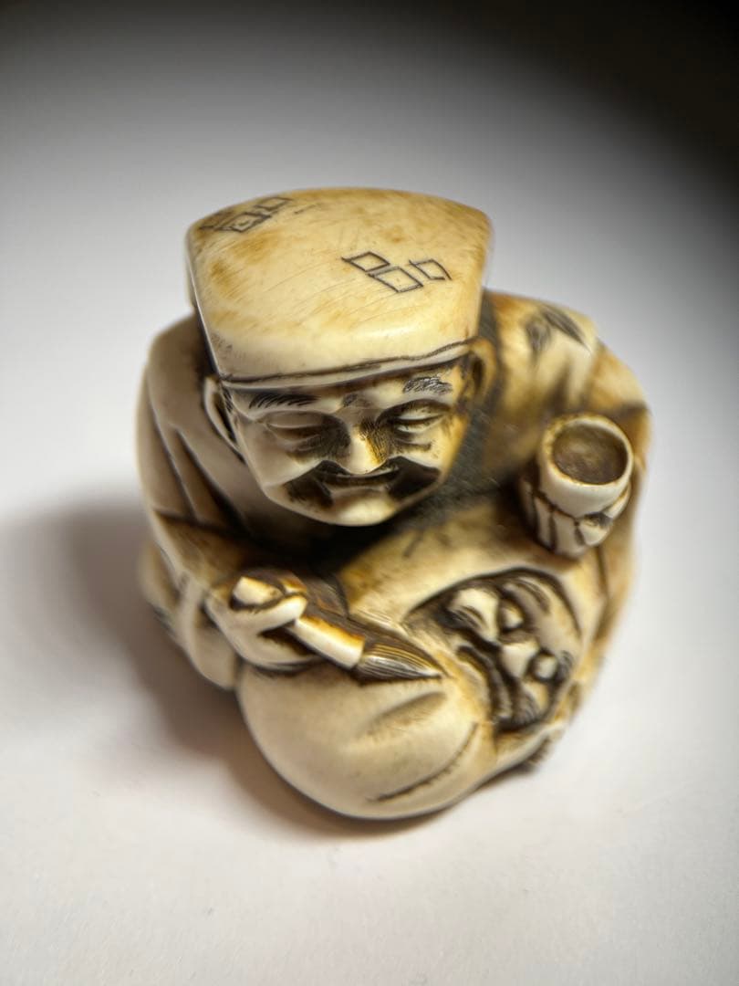 【銘あり】根付 大黒天風 骨 牙 （天然素材） 千広銘　29g