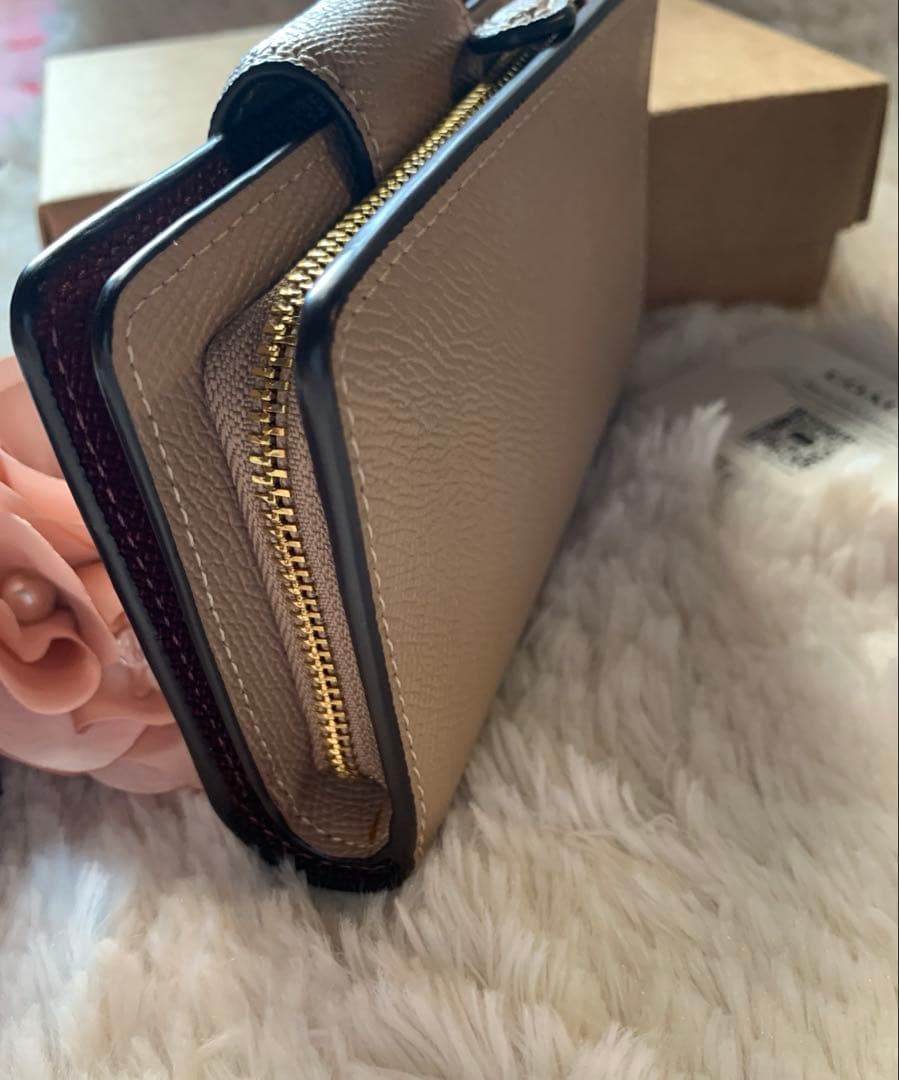 COACH ベージュ 二つ折り財布