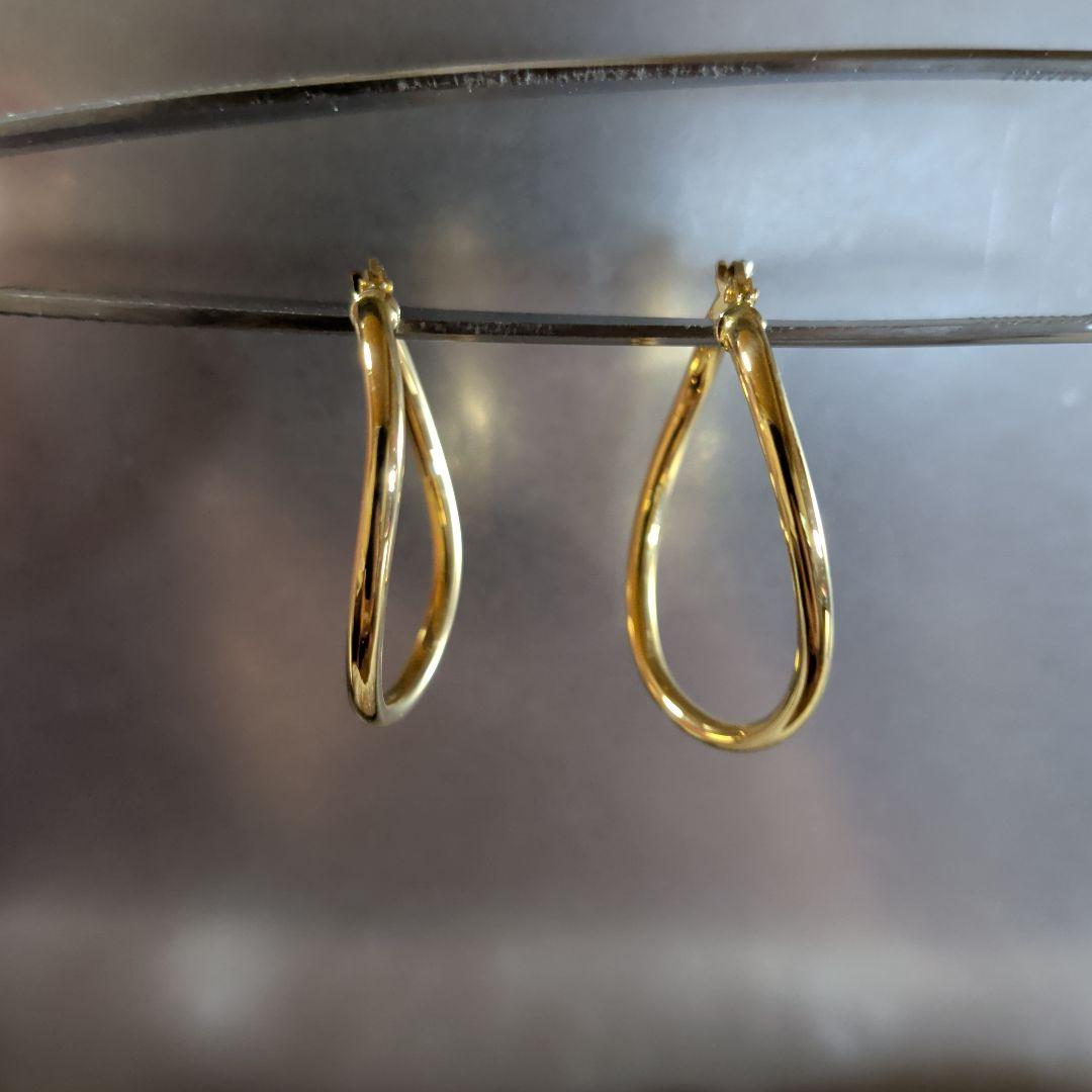 ピアス　UNOAERRE　750　YG　スナップ　ウェーブ　2.59g