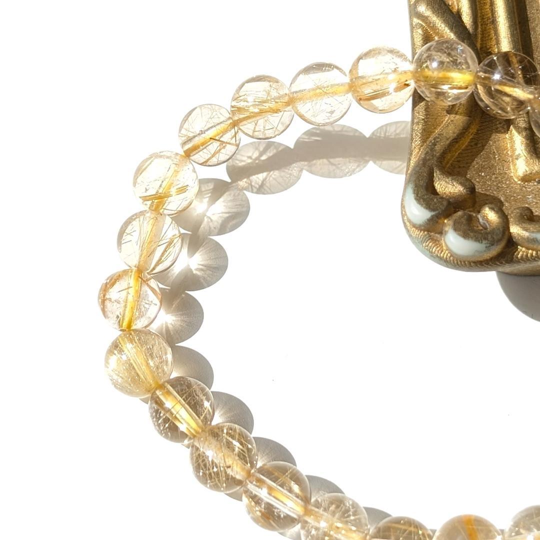 sk　透き通るクォーツと黄金ルチルが美しい 金針水晶ブレスレット 7mm