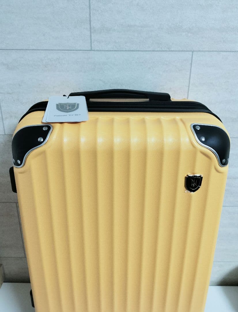 【新品未使用】New Tripスーツケース Mサイズ：4～7泊/60Lイエロー