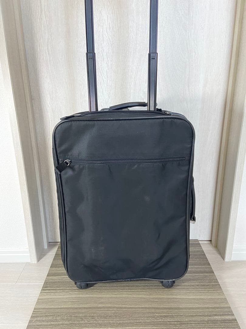 PRADA スーツケース　ナイロン　三角ロゴプレート　キャリーケース　黒　レザー