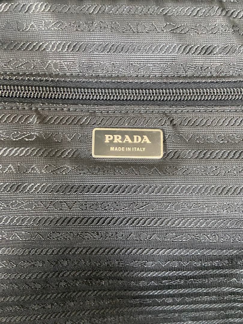 PRADA スーツケース　ナイロン　三角ロゴプレート　キャリーケース　黒　レザー