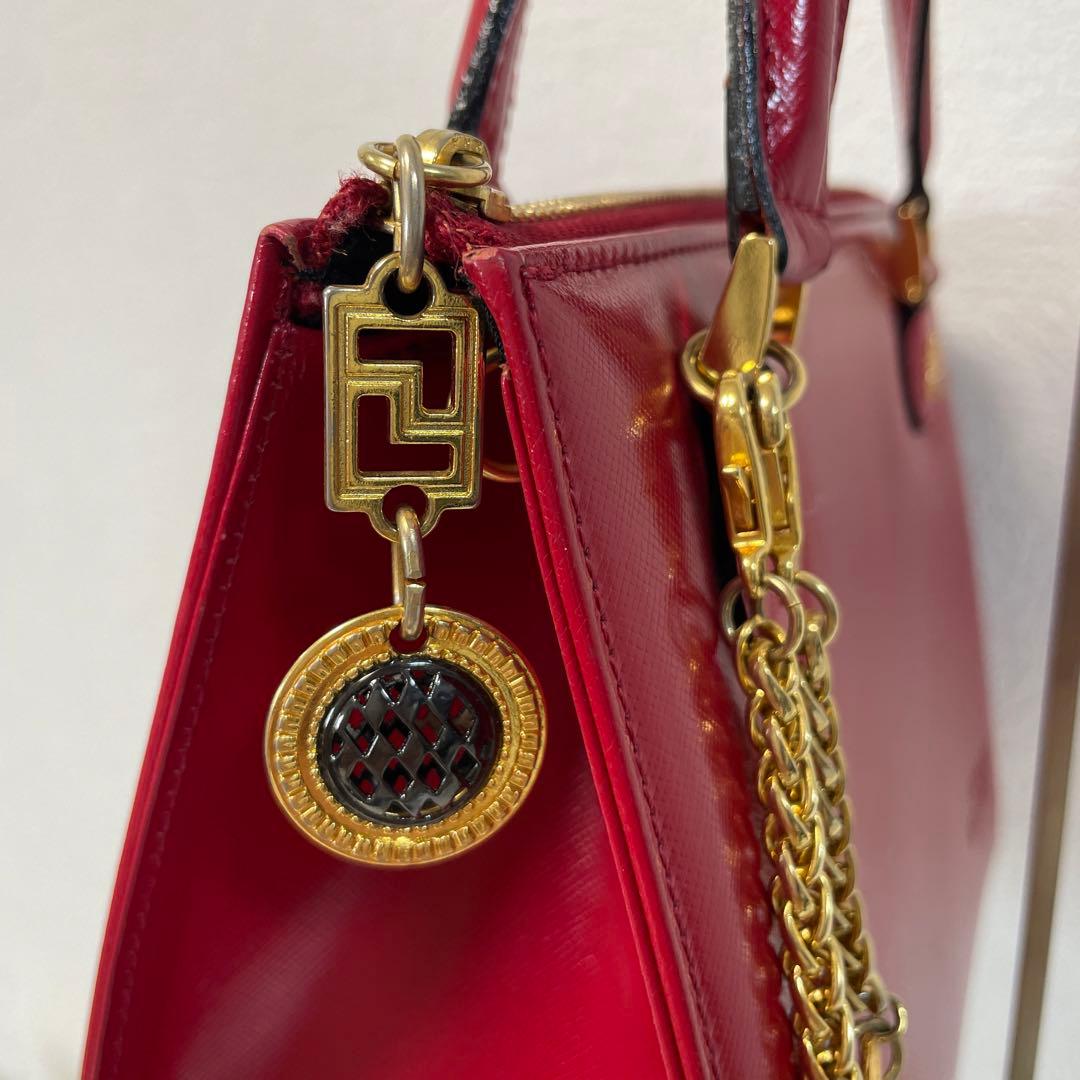 ジャンニヴェルサーチ ハンドバッグ 赤 レザー チャーム付