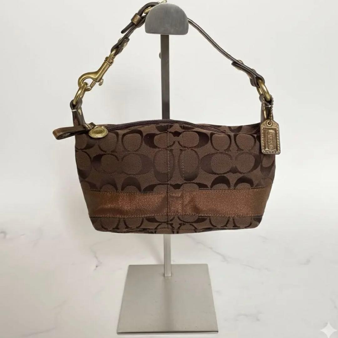 コーチ アクセサリーポーチ ミニハンドバッグ シグネチャー キャンバス 茶