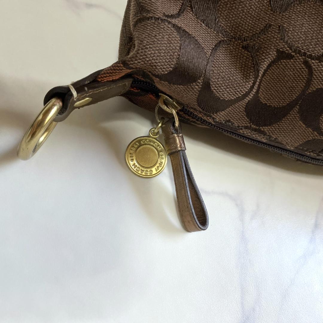 コーチ アクセサリーポーチ ミニハンドバッグ シグネチャー キャンバス 茶