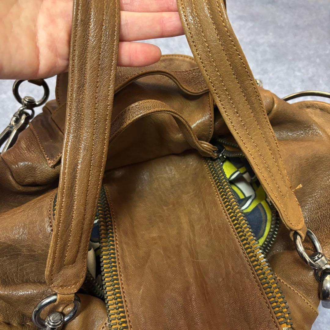 ジャマンピュエッシュ　レザー　ハンドバッグ　木製パーツ　がま口　総柄