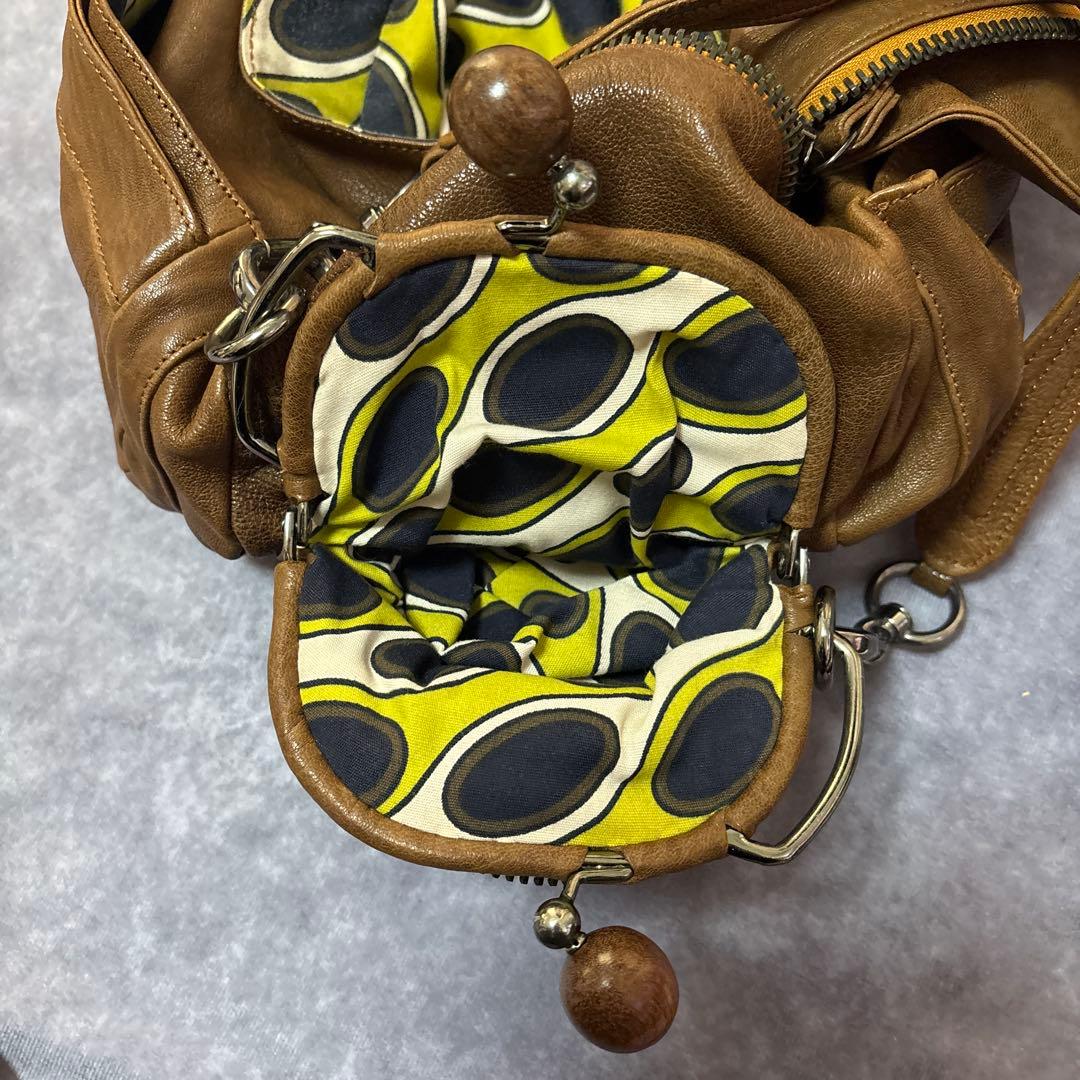 ジャマンピュエッシュ　レザー　ハンドバッグ　木製パーツ　がま口　総柄