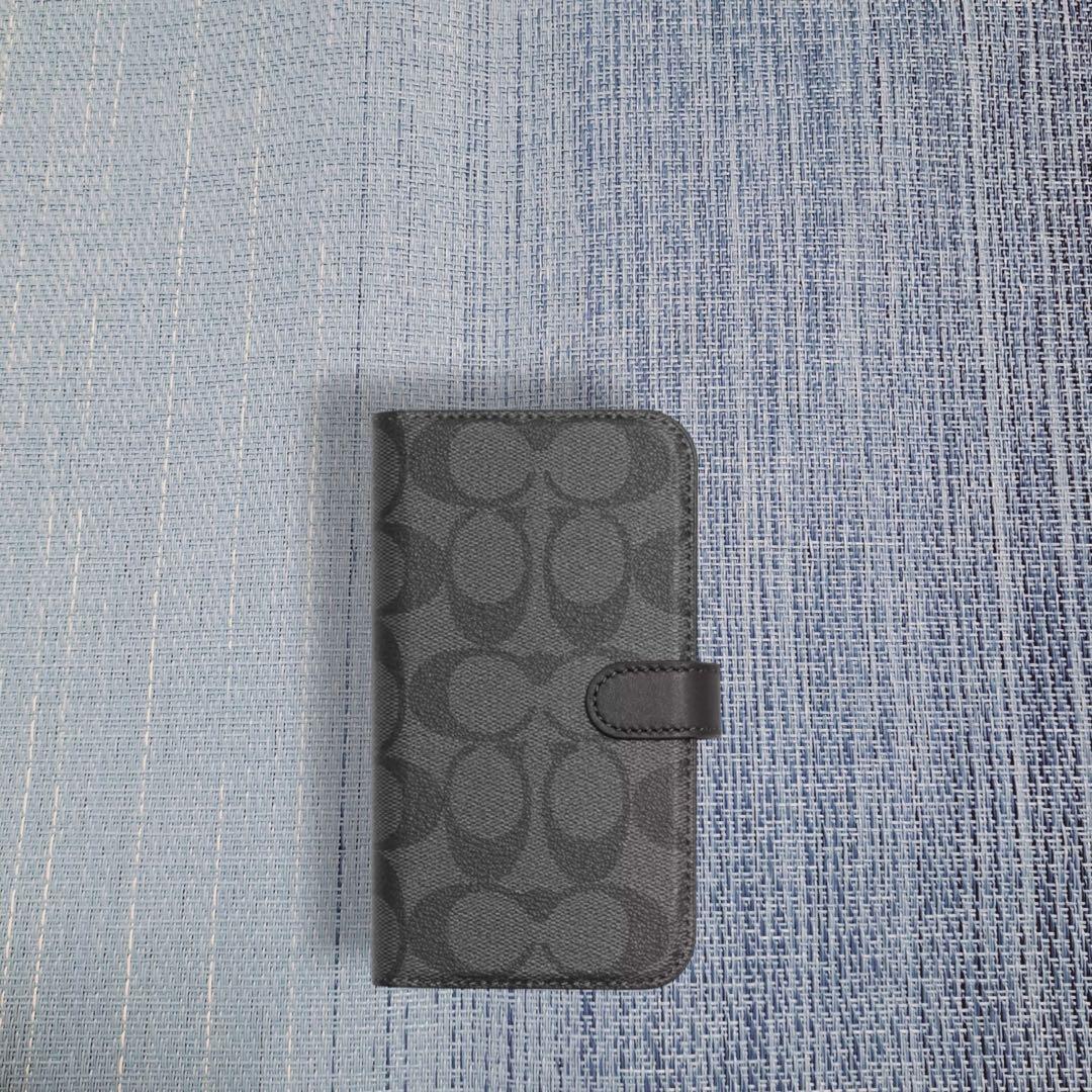 COACH iPhone14PROケース フォリオ・シグネチャー キャンバス