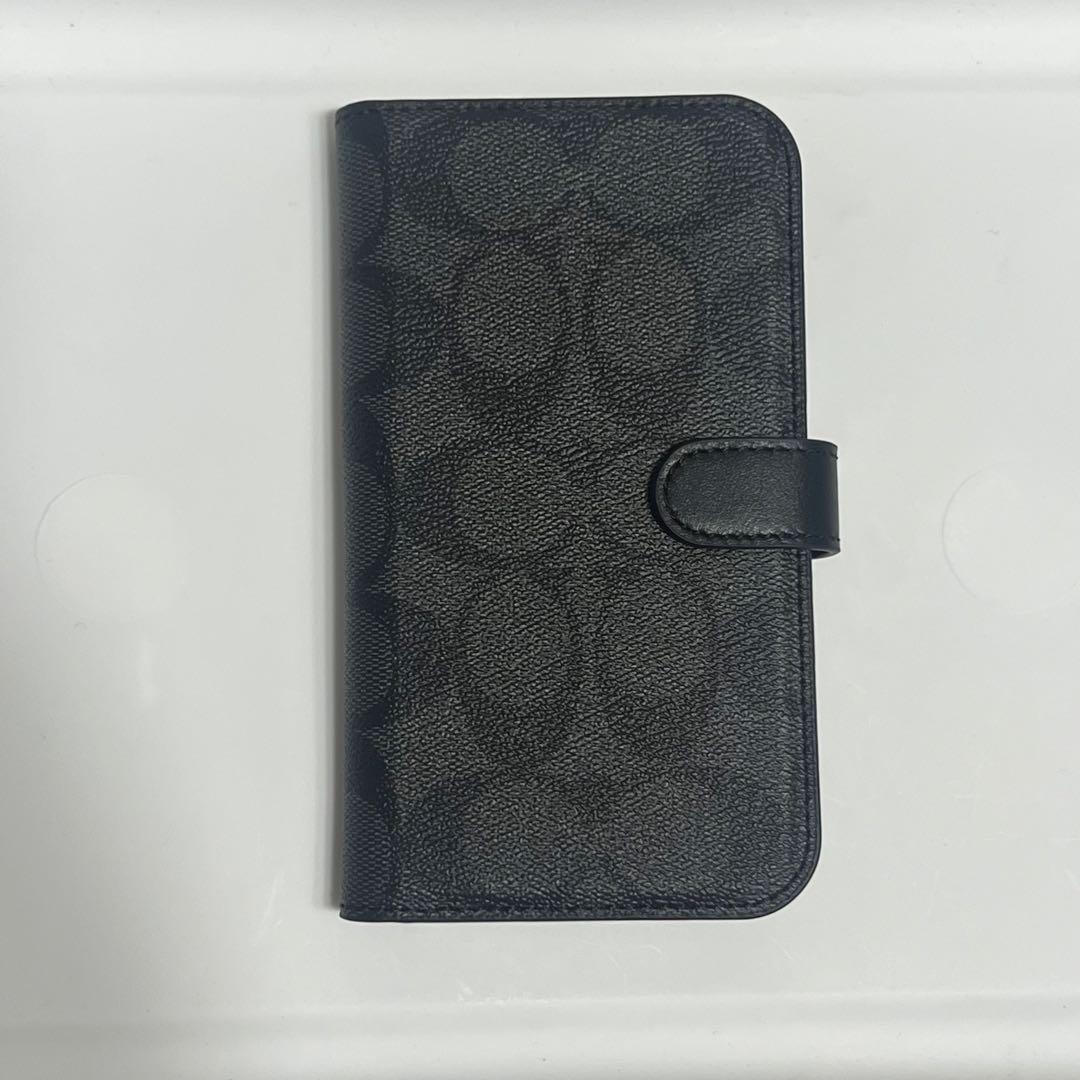 COACH iPhone14PROケース フォリオ・シグネチャー キャンバス